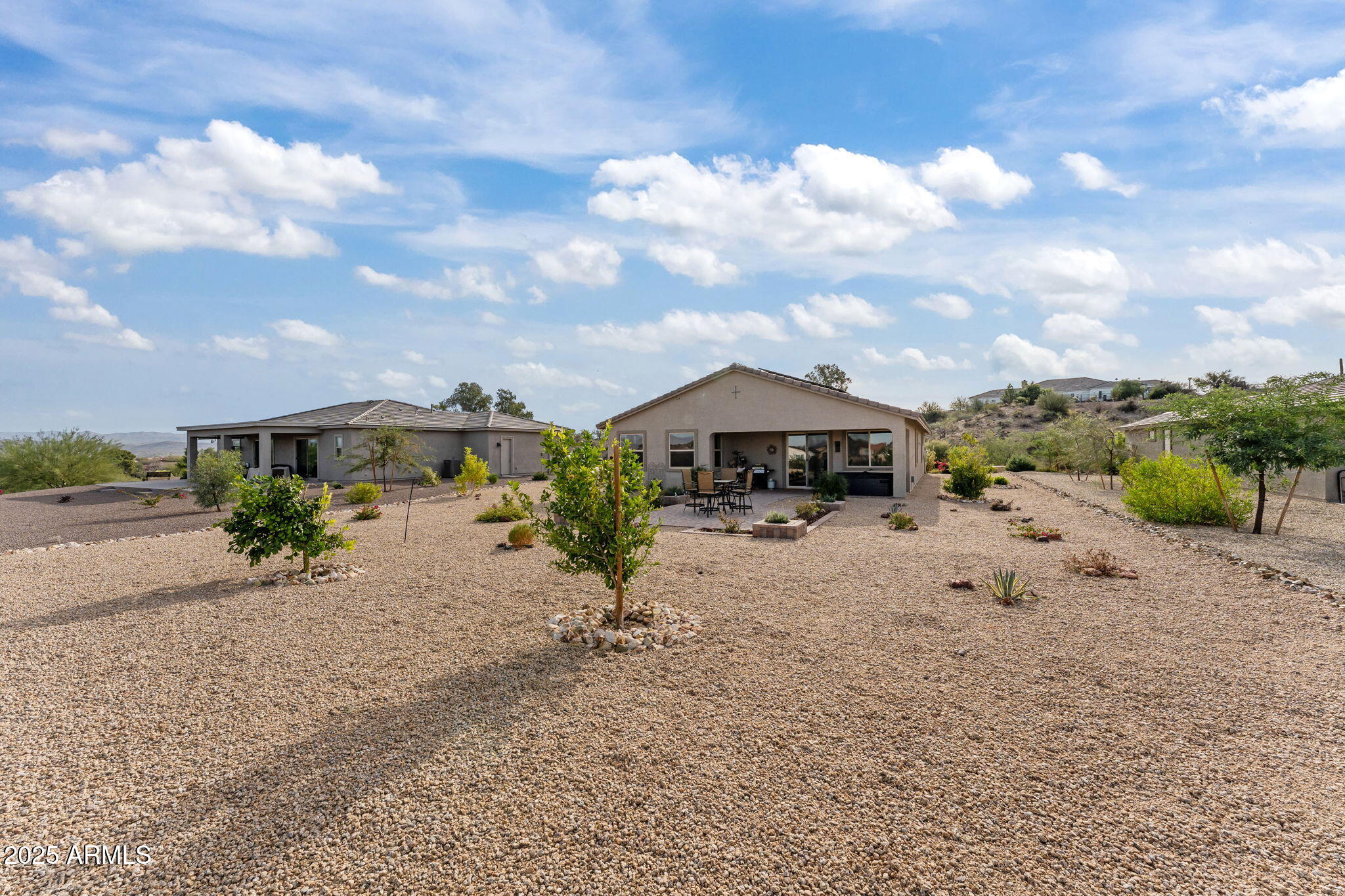 1900 West Ringo Road Wickenburg, AZ 85390 - Photo 29 of 37 a view of a street with a car parked in front of it