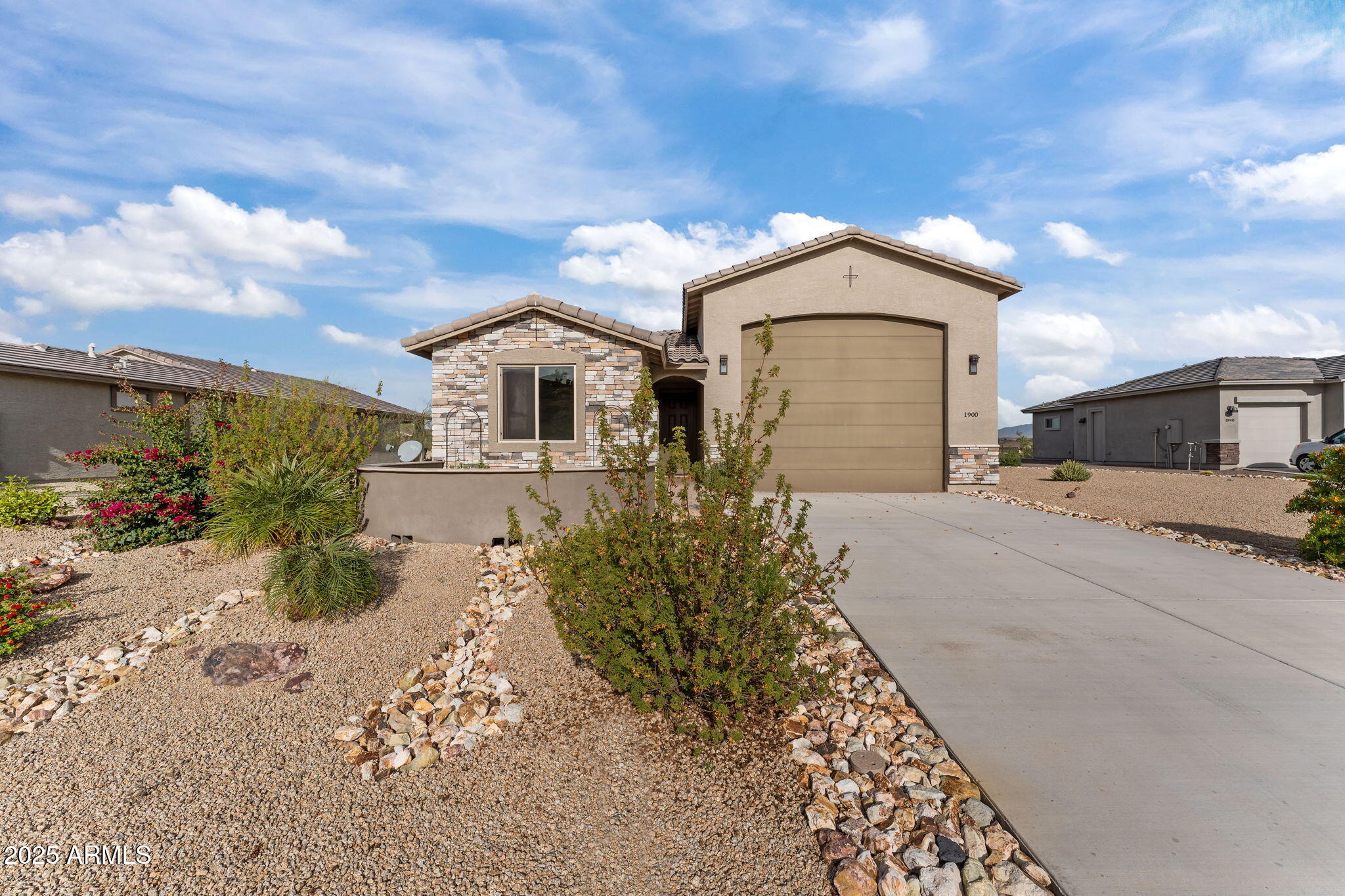 1900 West Ringo Road Wickenburg, AZ 85390 - Photo 37 of 37 front view of a house with a yard