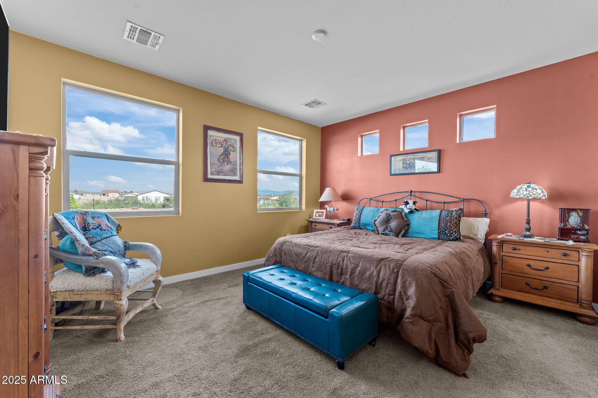 1900 West Ringo Road Wickenburg, AZ 85390 - Photo 6 of 37 a spacious bedroom with a bed and a window