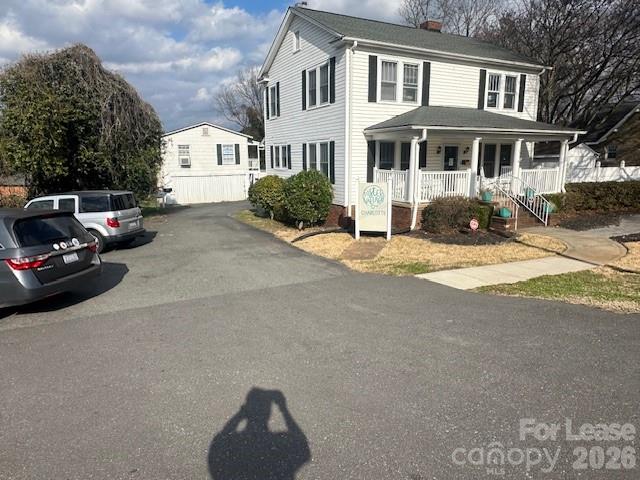 4911 Monroe Road Charlotte, NC 28205 - Photo 15 of 15 a view of a car park in front of house