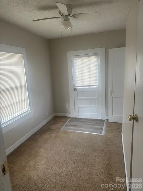 4911 Monroe Road Charlotte, NC 28205 - Photo 3 of 15 an empty room with windows and closet