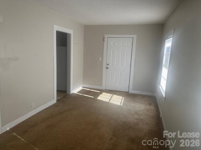 4911 Monroe Road Charlotte, NC 28205 - Photo 6 of 15 a view of an empty room and window
