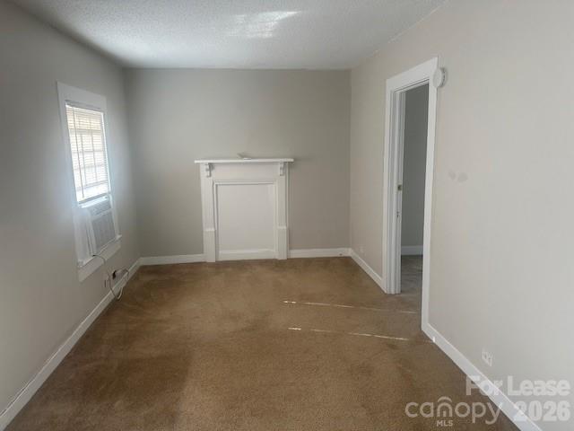 4911 Monroe Road Charlotte, NC 28205 - Photo 7 of 15 an empty room with a empty space and window