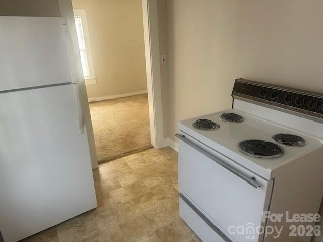 4911 Monroe Road Charlotte, NC 28205 - Photo 9 of 15 a utility room with dryer and washer