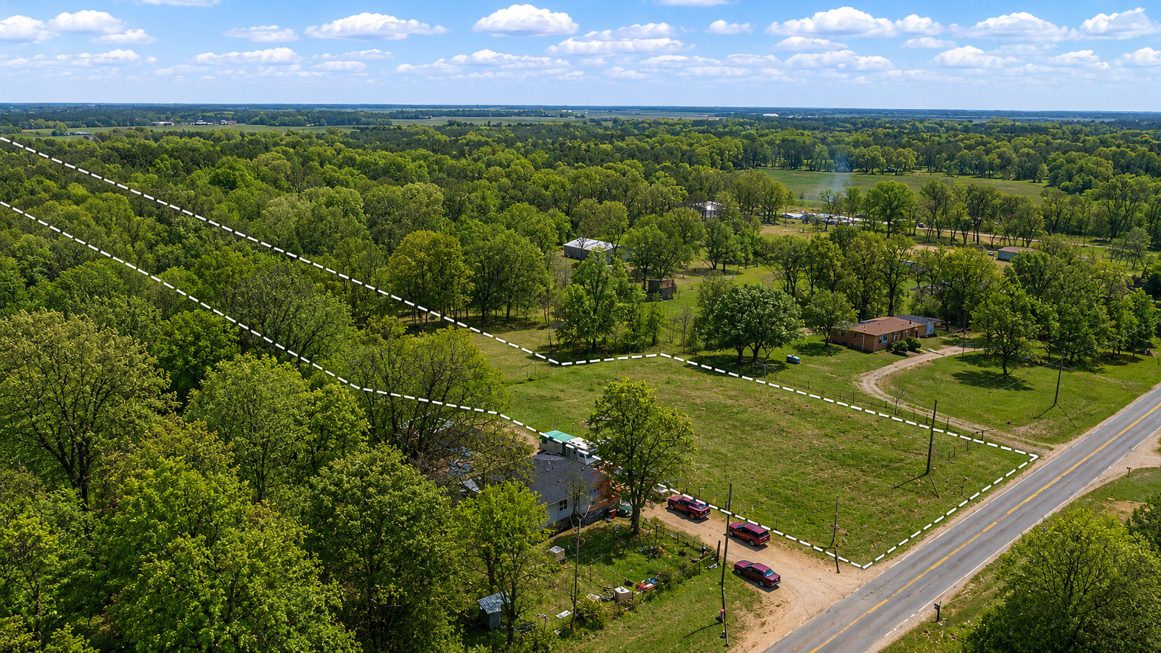 4459 South 13000E Road Pembroke Township, IL 60958 - Photo 4 of 6 a view of a city with flower plants and large trees