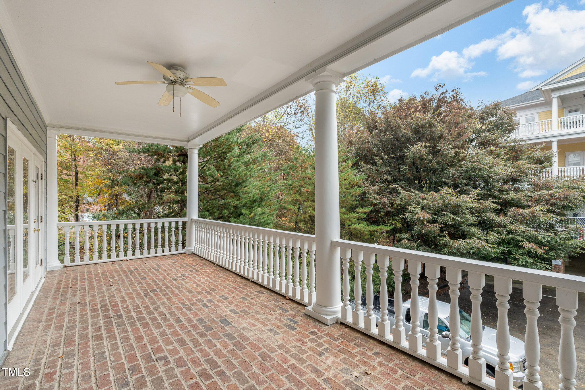 7530 Lead Mine Road, Unit 102 Raleigh, NC 27615 - Photo 17 of 18 a view of a balcony with wooden floor