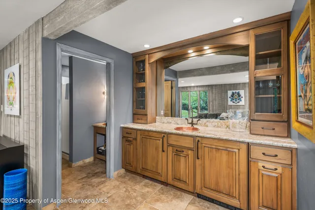 a view of balcony with wooden floor and fence