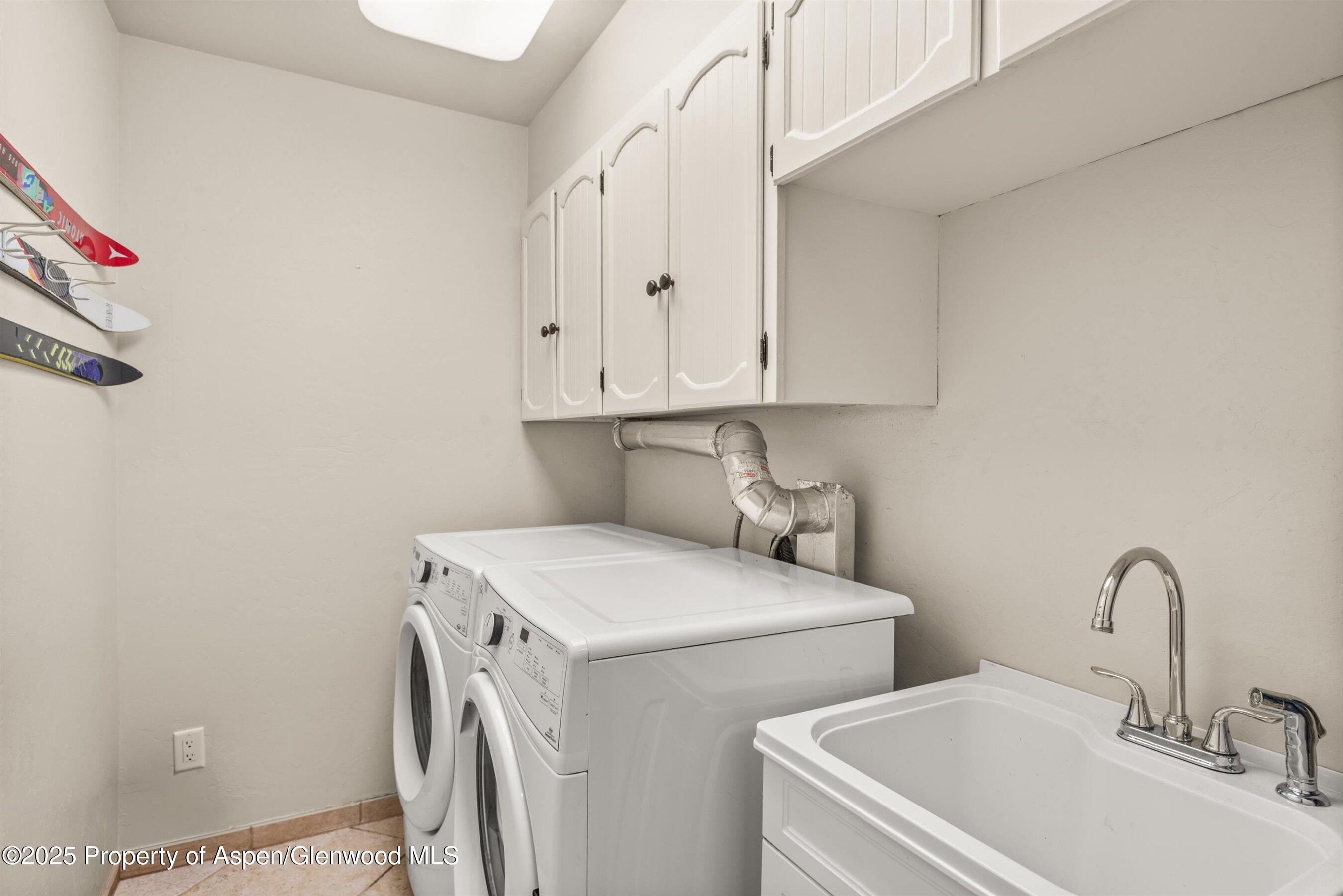 49 Elk Ridge Lane Snowmass Village, CO 81615 - Photo 35 of 38 a utility room with dryer and washer