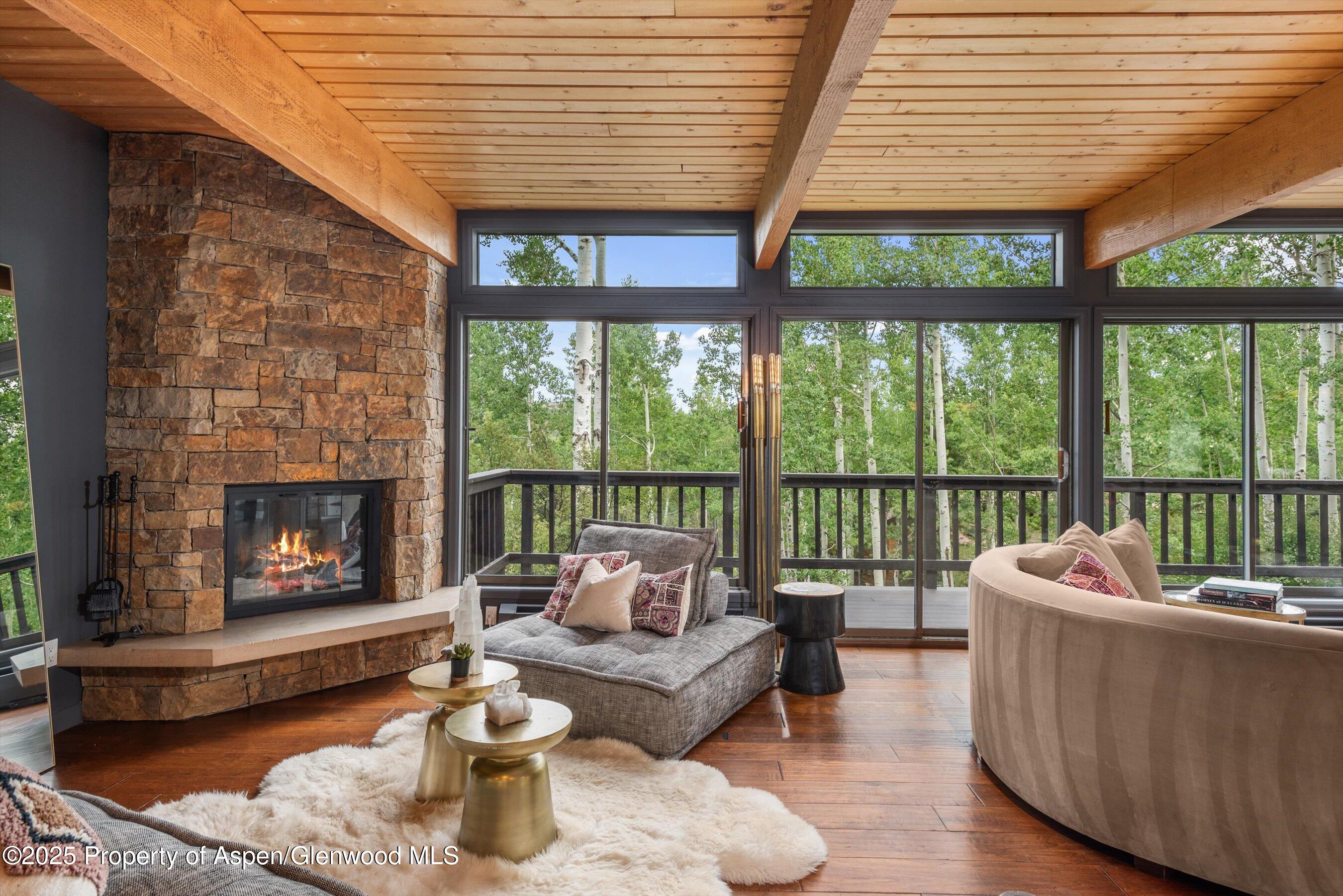 49 Elk Ridge Lane Snowmass Village, CO 81615 - Photo 5 of 38 stone fireplace