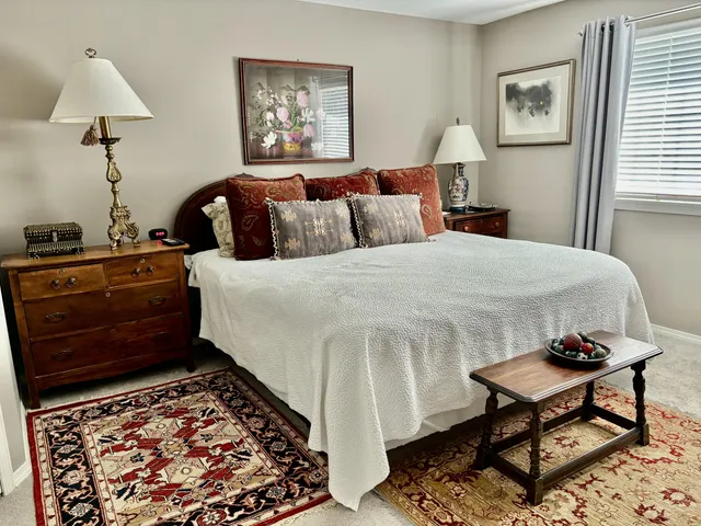 a view of a chairs and table in a patio