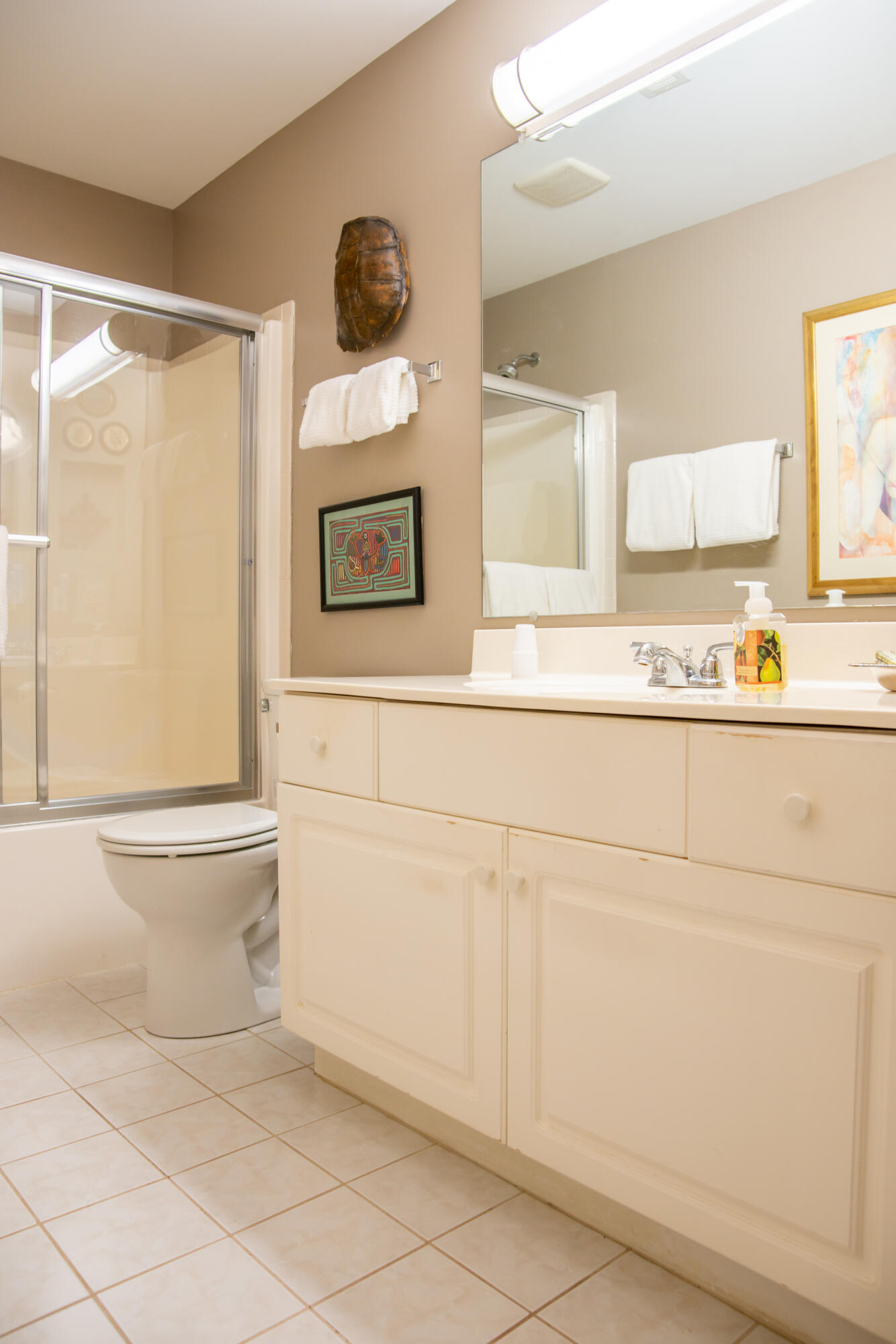 406 Sturdy Road, Unit A12 Valparaiso, IN 46383 - Photo 18 of 20 a bathroom with a sink a toilet and mirror