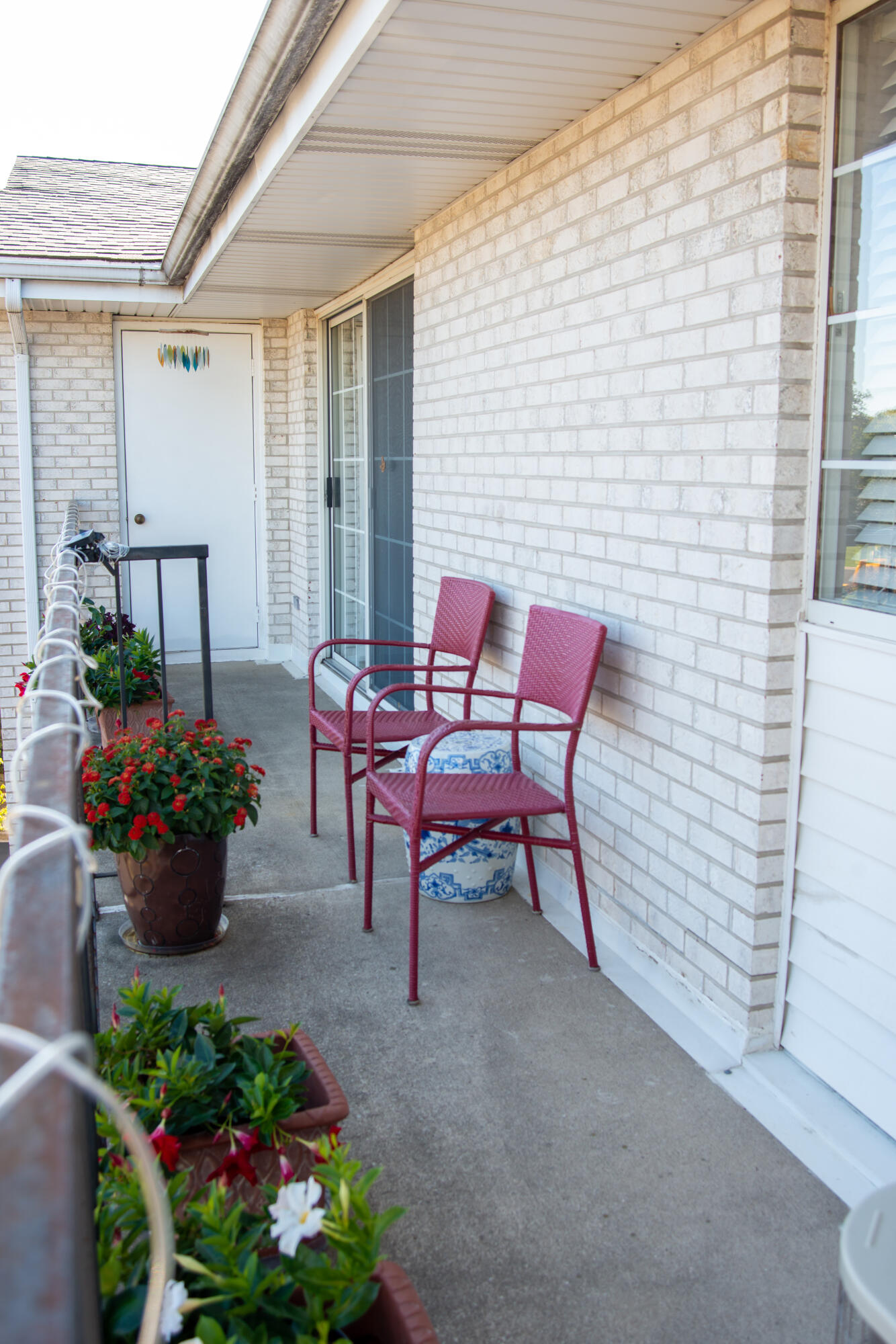 406 Sturdy Road, Unit A12 Valparaiso, IN 46383 - Photo 19 of 20 a view of a chairs and table in a patio