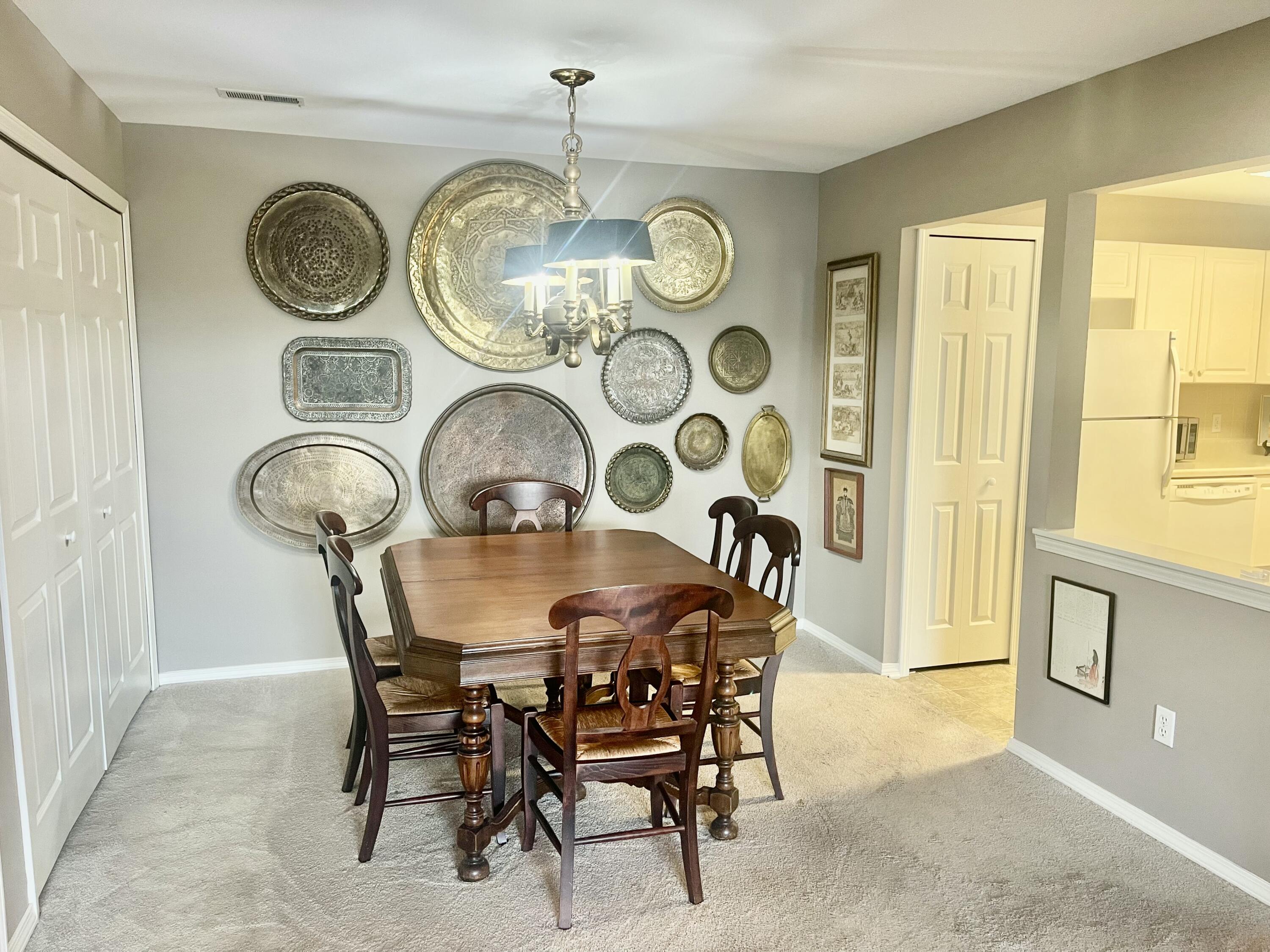 406 Sturdy Road, Unit A12 Valparaiso, IN 46383 - Photo 5 of 20 a view of a dining area with furniture and a window