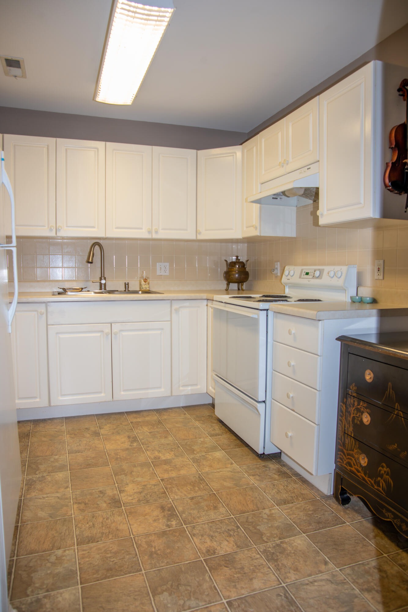 406 Sturdy Road, Unit A12 Valparaiso, IN 46383 - Photo 10 of 20 a kitchen with cabinets a sink and appliances