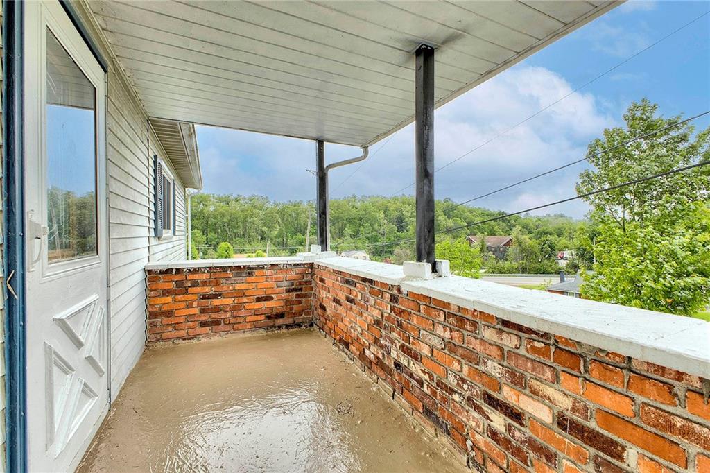 8002 Hayward Street Irwin, PA 15642 - Photo 6 of 31 a view of balcony with street