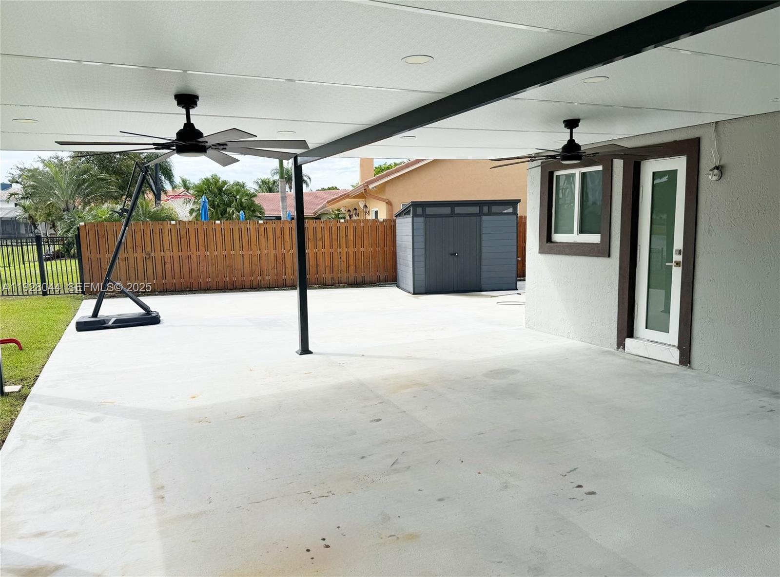 15500 Carriage Court Davie, FL 33331 - Photo 20 of 26 a view of a backyard of a house