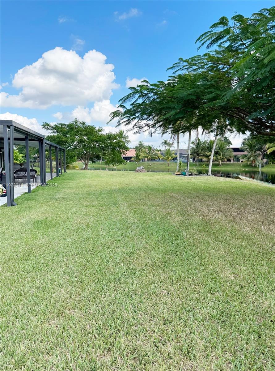 15500 Carriage Court Davie, FL 33331 - Photo 23 of 26 a view of field with a big yard