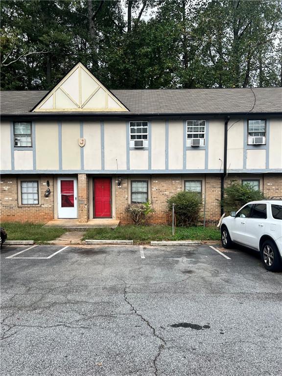 1150 Rankin Street, Unit 4J Stone Mountain, GA 30083 - Photo 1 of 16 a view of multiple houses
