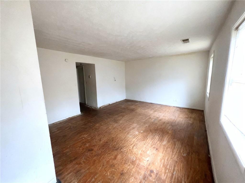 1150 Rankin Street, Unit 4J Stone Mountain, GA 30083 - Photo 2 of 16 an empty room with a window