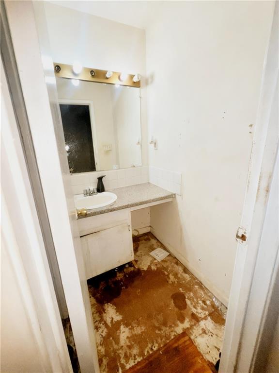 1150 Rankin Street, Unit 4J Stone Mountain, GA 30083 - Photo 10 of 16 a bathroom with a sink toilet and vanity