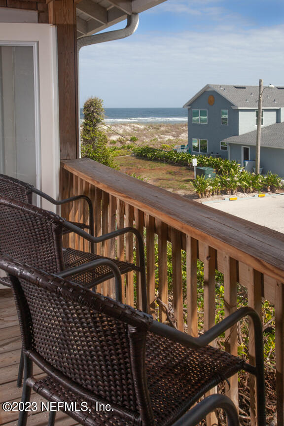 1416 Strand Street Neptune Beach, FL 32266 - Photo 16 of 27 a view of a chairs and table in the balcony