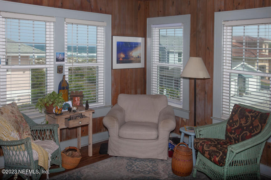 1416 Strand Street Neptune Beach, FL 32266 - Photo 19 of 27 a living room with furniture and a window
