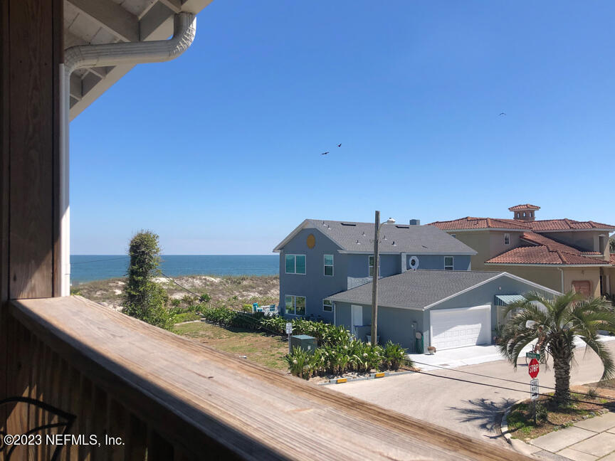 1416 Strand Street Neptune Beach, FL 32266 - Photo 26 of 27 a front view of a house with a yard
