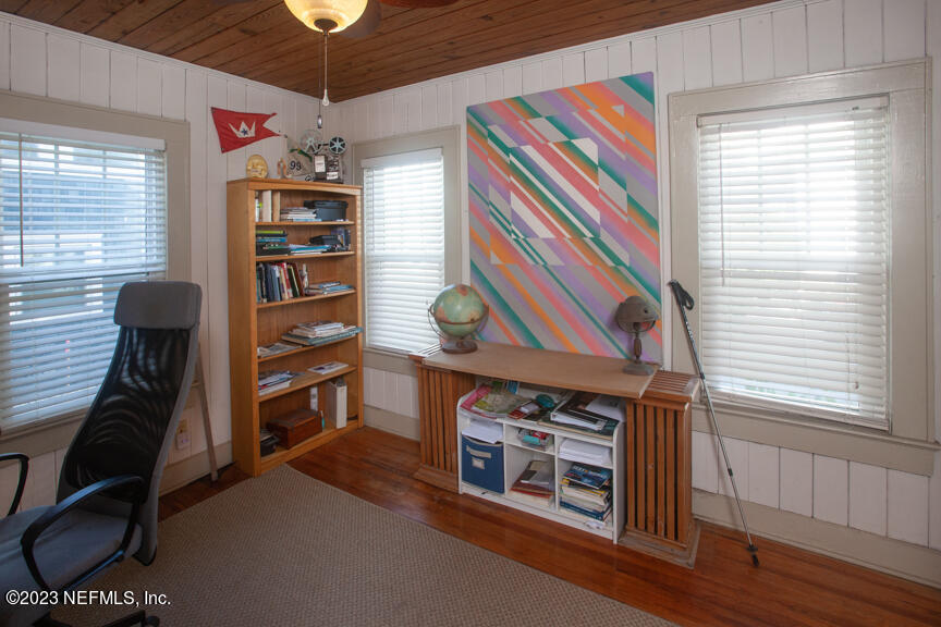 1416 Strand Street Neptune Beach, FL 32266 - Photo 7 of 27 a view of a workspace with furniture and a window