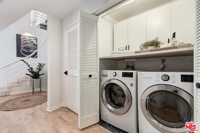 a bedroom with furniture and a fireplace