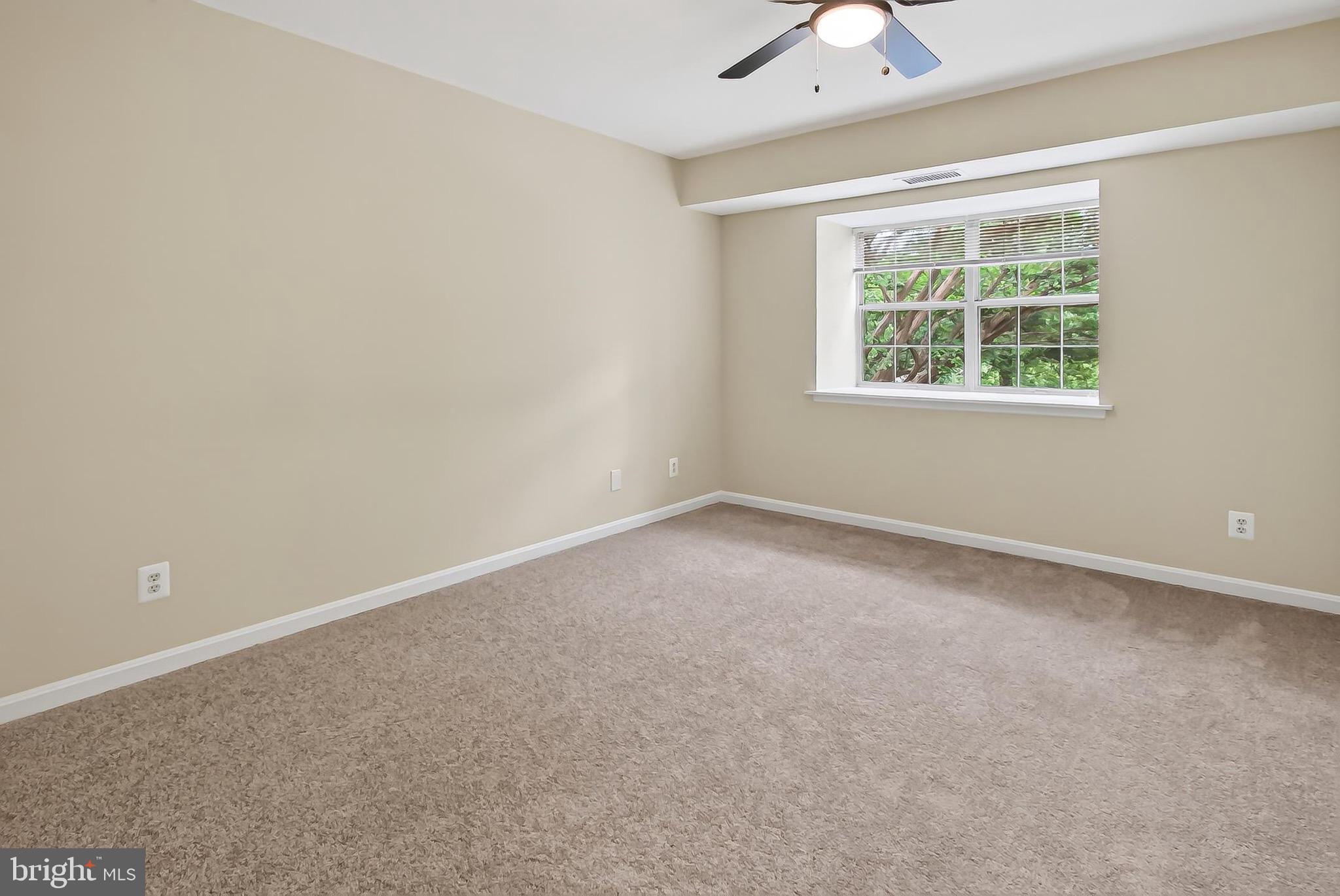 5835 Cove Landing Road, Unit 304 Burke, VA 22015 - Photo 14 of 37 Primary bedroom with celling fan, new carpet...