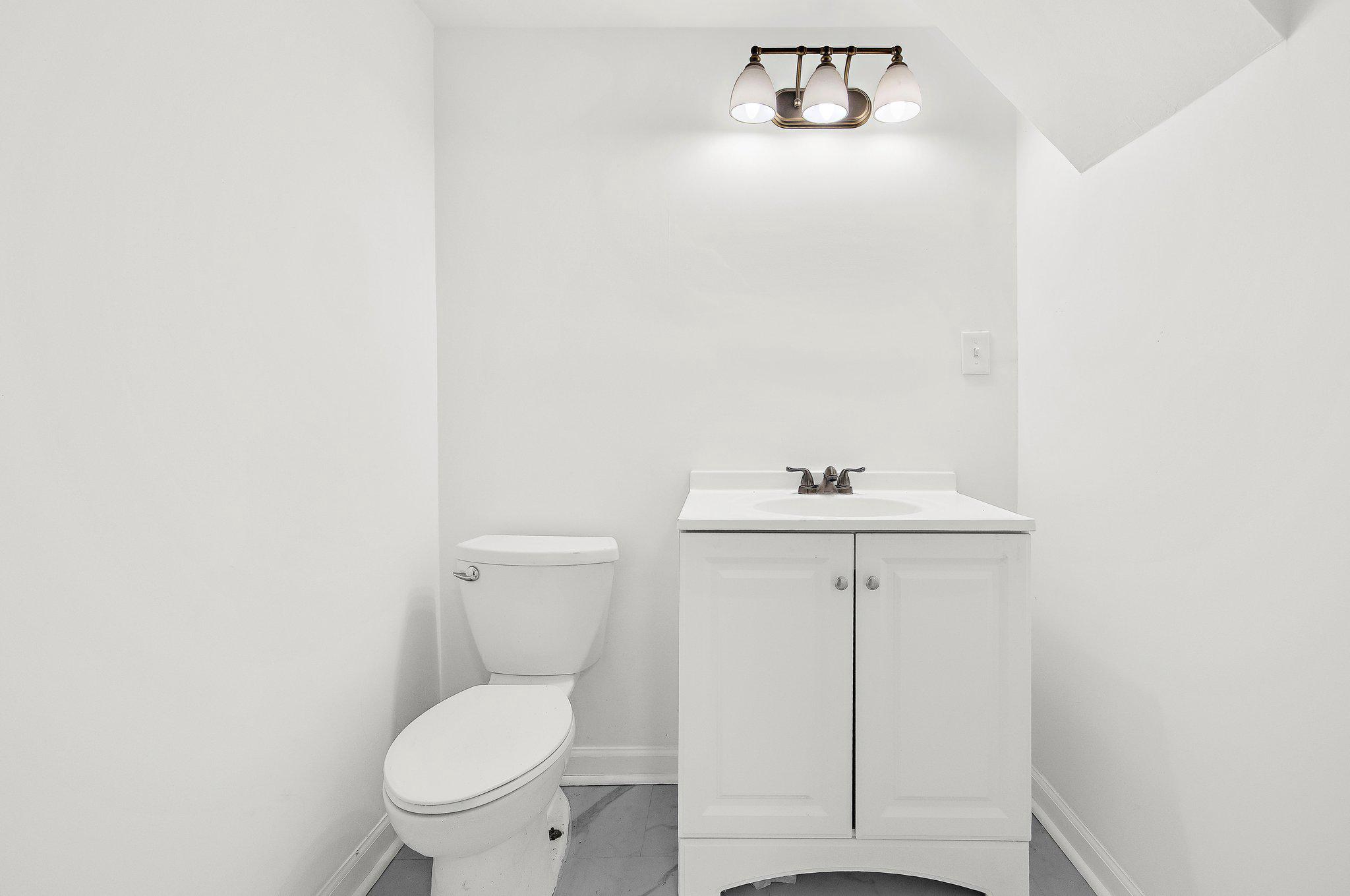 5822 Forest Hill Road Elkridge, MD 21075 - Photo 43 of 55 Remodeled lower level half bath