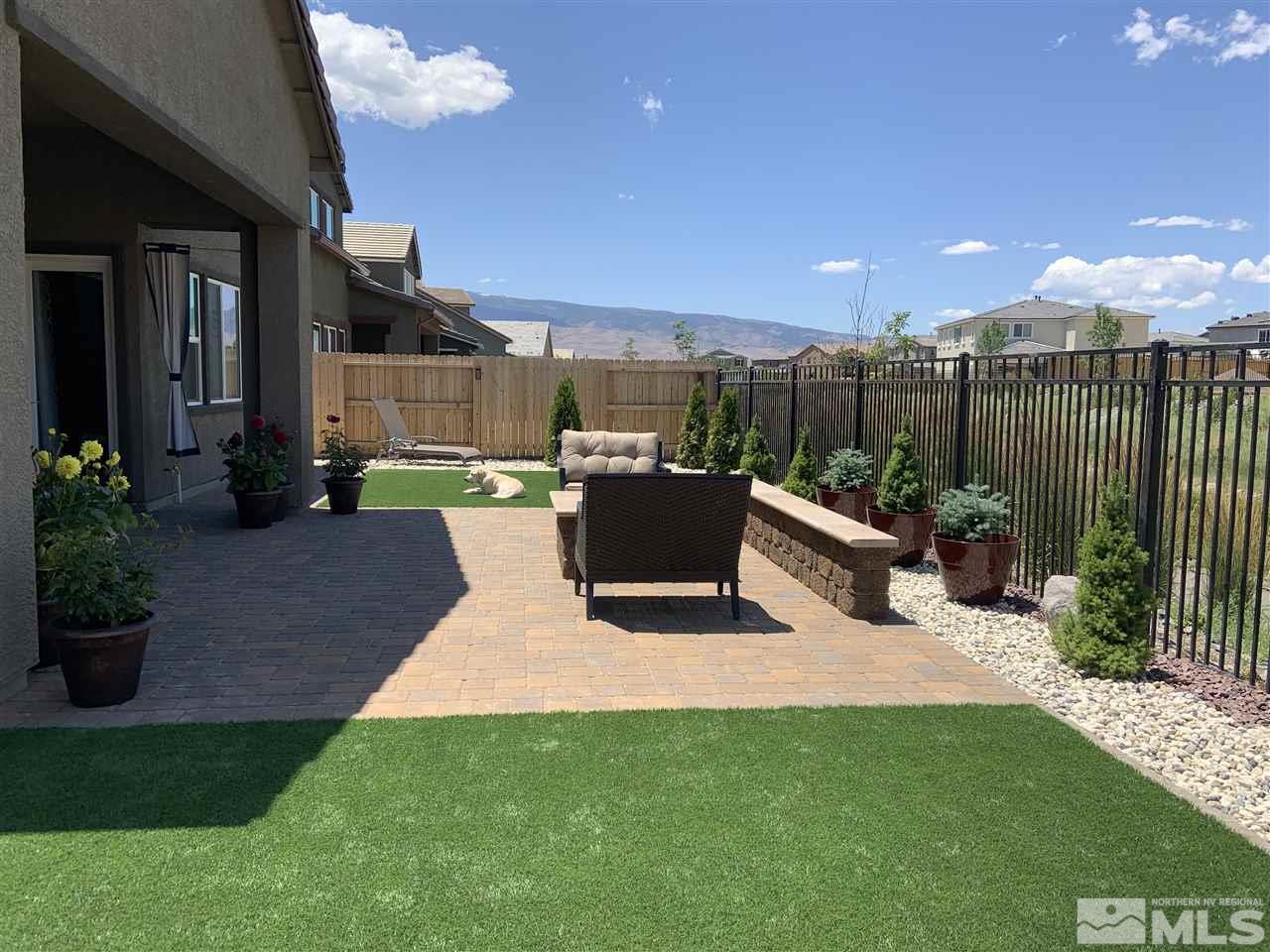 2335 Buttermere Drive Reno, NV 89521 - Photo 22 of 37 a view of a backyard with sitting area and furniture