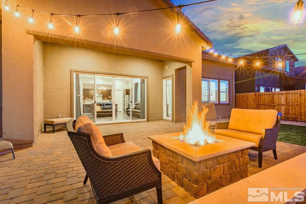 2335 Buttermere Drive Reno, NV 89521 - Photo 24 of 37 a outdoor space with patio the couches and a dining table with the view of kitchen