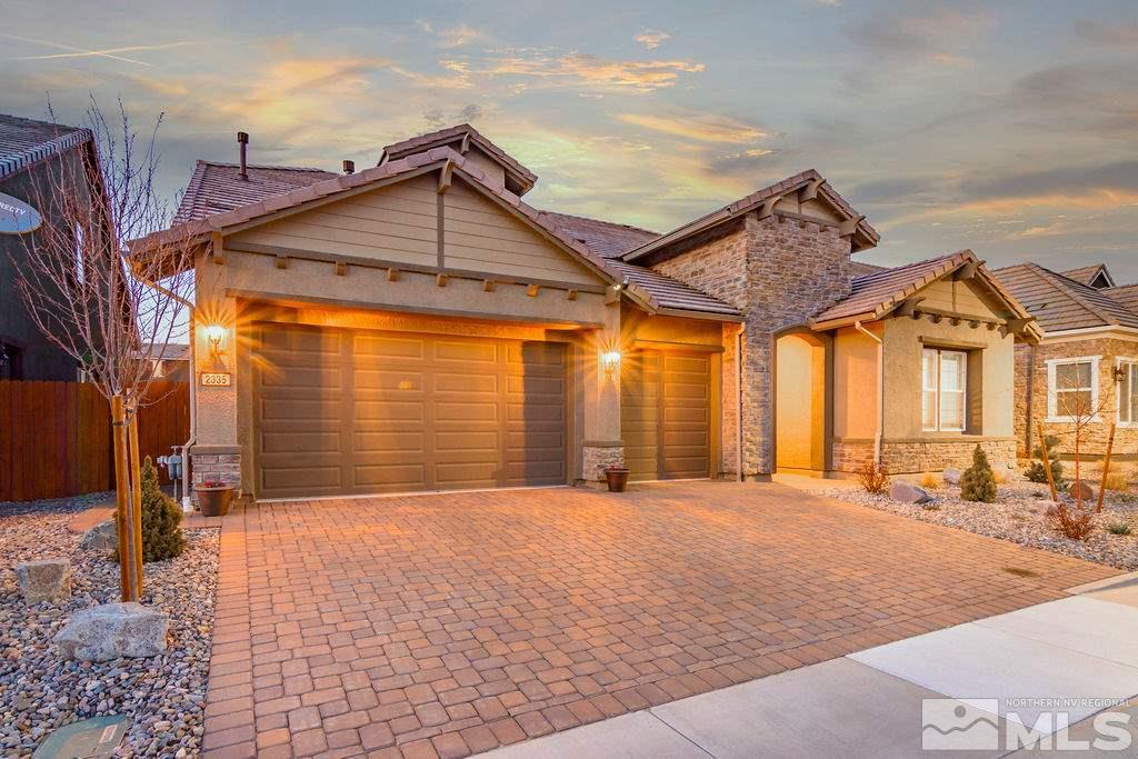 2335 Buttermere Drive Reno, NV 89521 - Photo 3 of 37 a front view of a house with a outdoor space