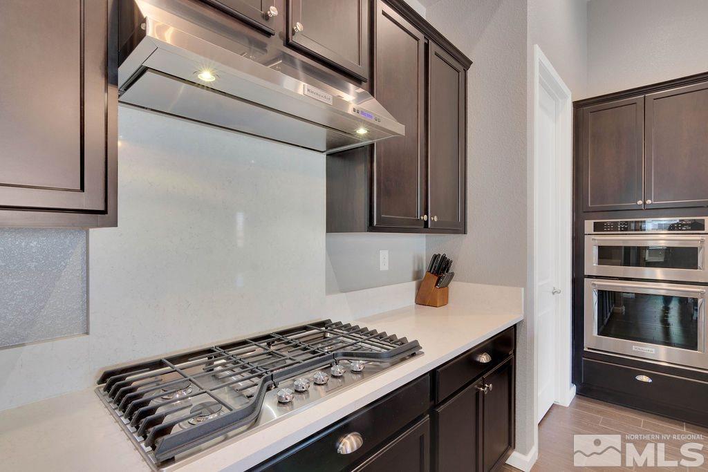 2335 Buttermere Drive Reno, NV 89521 - Photo 9 of 37 a kitchen with a stove and a microwave