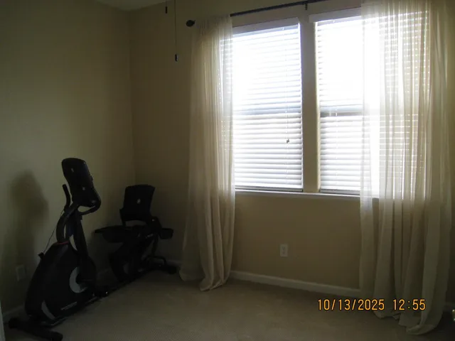 a room with window and furniture