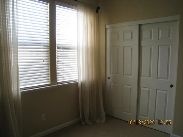 a view of a room that has a window in it