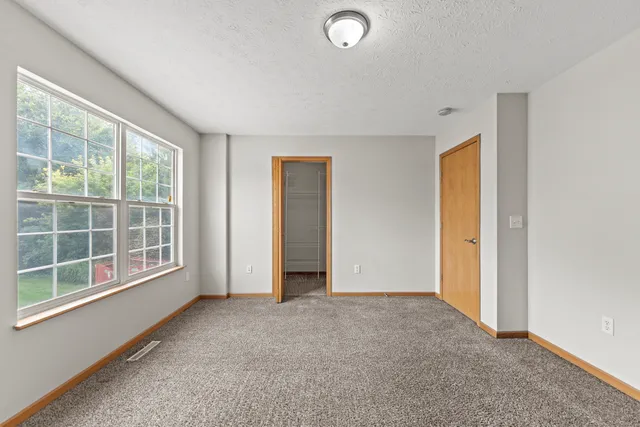 an empty room with windows