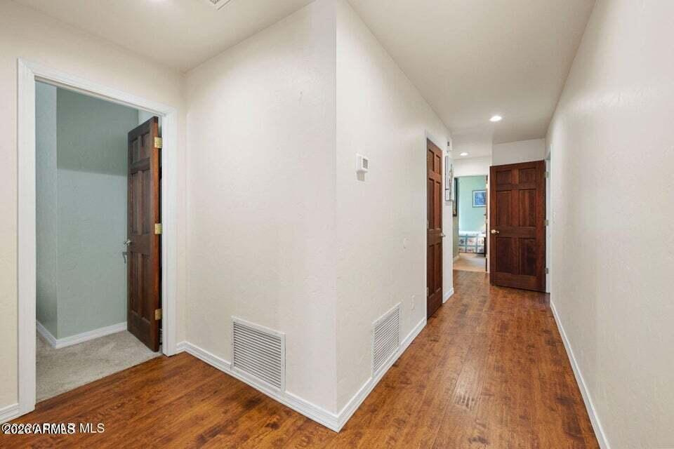 4969 West Iron Springs Road Prescott, AZ 86305 - Photo 20 of 44 a view of hallway with wooden floor