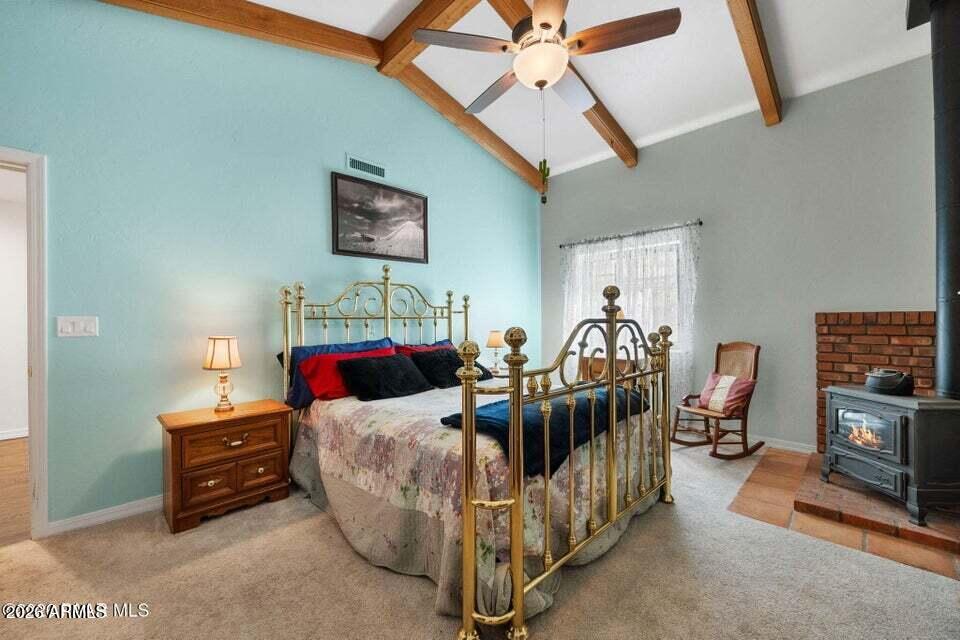 4969 West Iron Springs Road Prescott, AZ 86305 - Photo 25 of 44 a bedroom with furniture and a chandelier