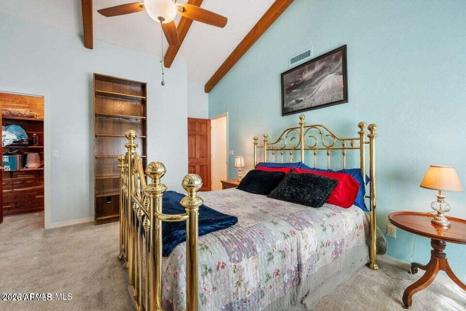4969 West Iron Springs Road Prescott, AZ 86305 - Photo 26 of 44 a bedroom with a bed and dresser