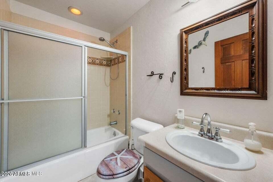 4969 West Iron Springs Road Prescott, AZ 86305 - Photo 27 of 44 a bathroom with a sink and a mirror