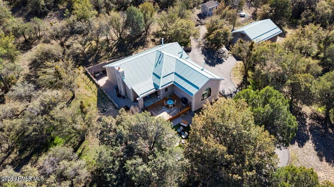 4969 West Iron Springs Road Prescott, AZ 86305 - Photo 2 of 44 an aerial view of a house with a yard