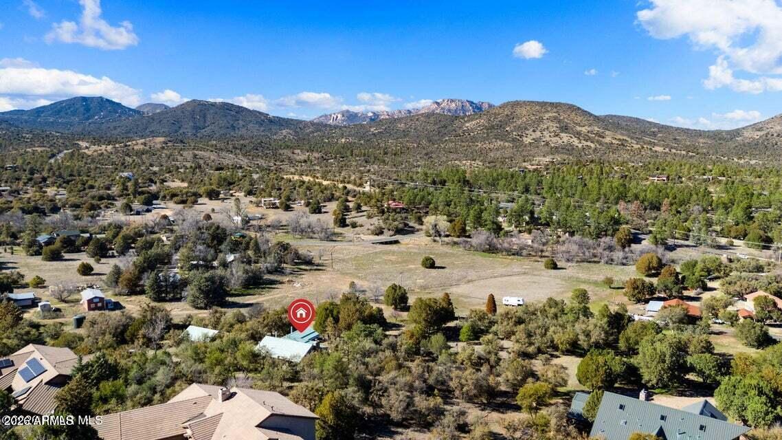 4969 West Iron Springs Road Prescott, AZ 86305 - Photo 43 of 44 a view of a town with mountains in the background