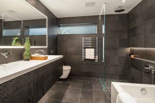 a bedroom with a bed and a table in it