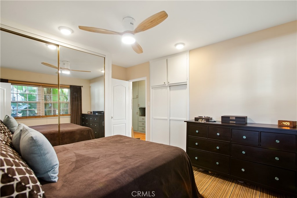 9253 Rose Street Bellflower, CA 90706 - Photo 17 of 36 a bedroom with a bed and window