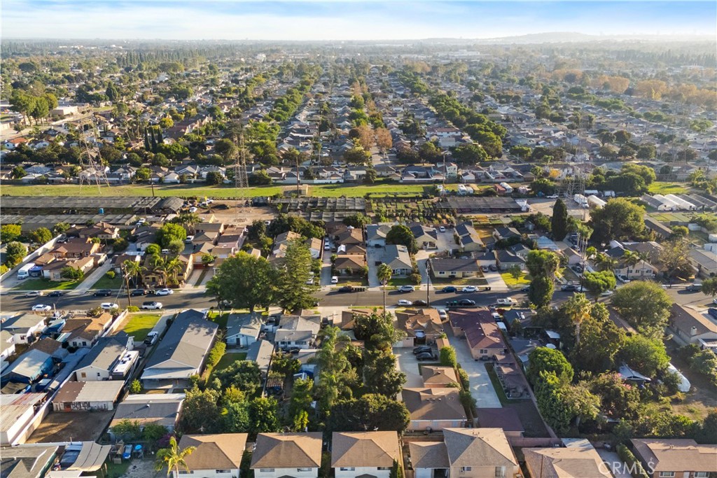 9253 Rose Street Bellflower, CA 90706 - Photo 35 of 36 an aerial view of residential building and lake view