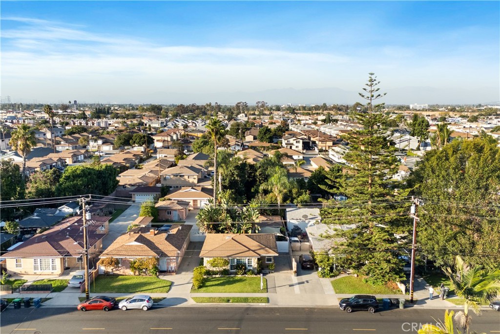 9253 Rose Street Bellflower, CA 90706 - Photo 36 of 36 an aerial view of residential houses with outdoor space