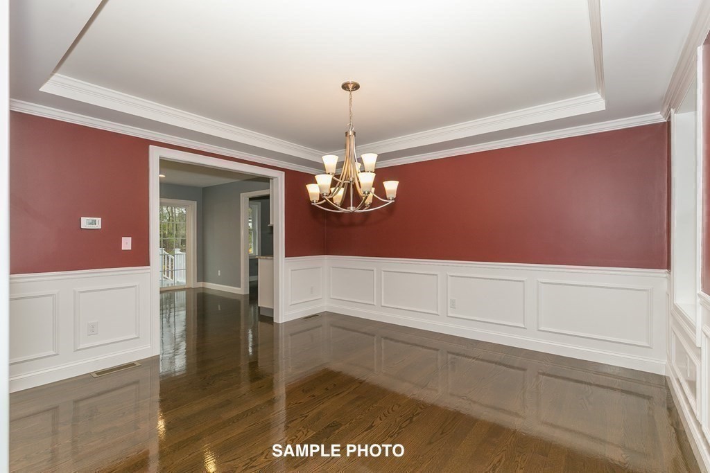 687 Boston Road Billerica, MA 01821 - Photo 11 of 20 a view of kitchen with granite countertop cabinets and dining table