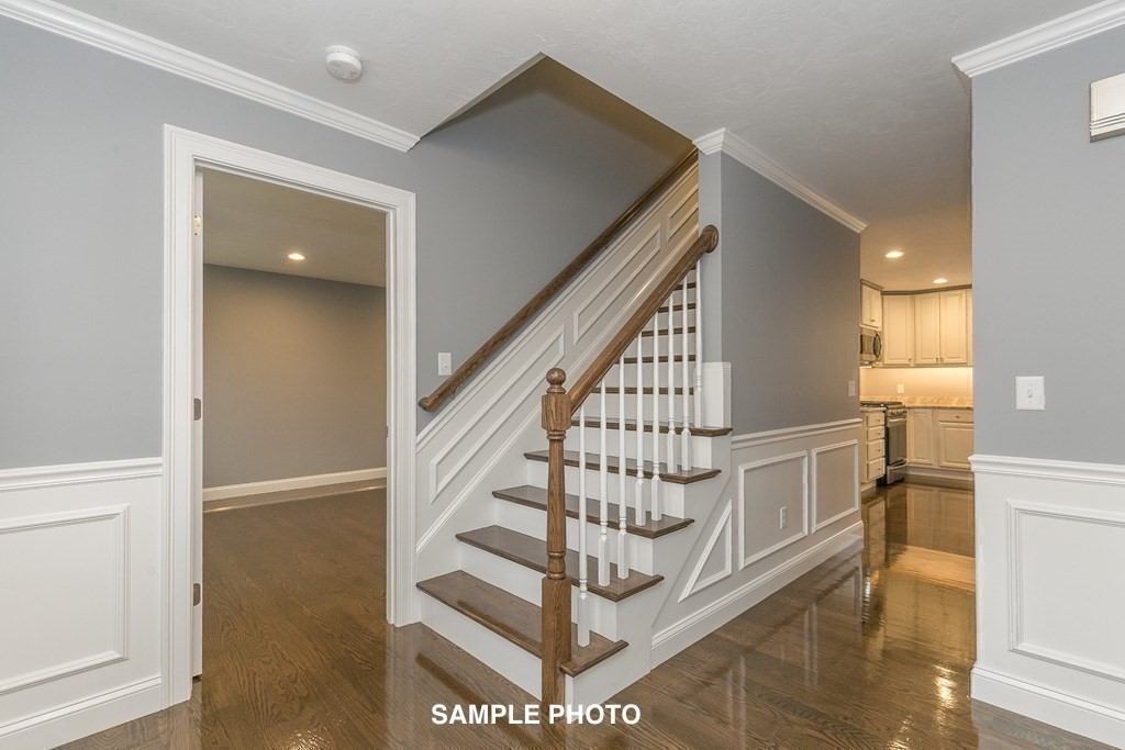 687 Boston Road Billerica, MA 01821 - Photo 14 of 20 a view of entryway and hall with wooden floor